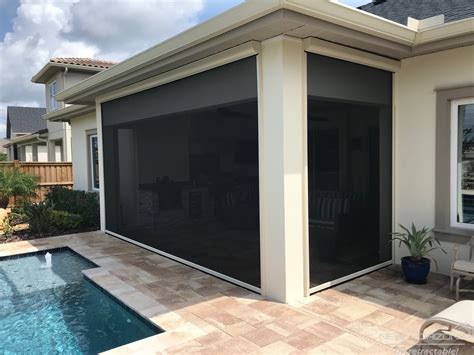 electric patio screen enclosure|motorized retractable screens for porches.